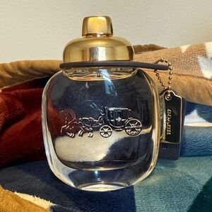 Coach Gold-Capped Clear Glass Perfume Bottle